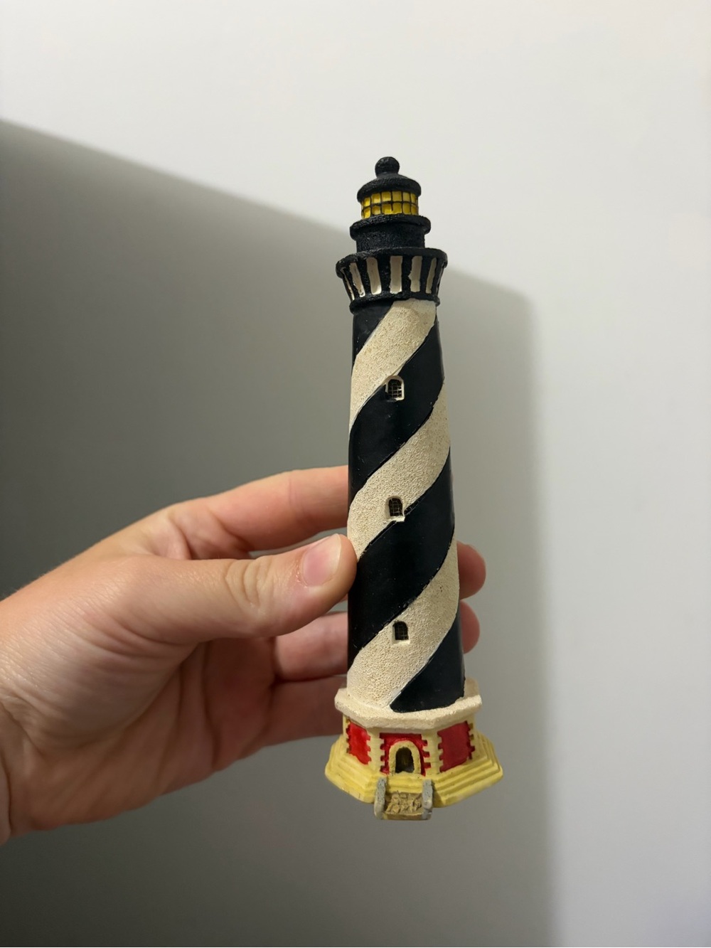 Black & Cream Striped Lighthouse Figurine with Yellow Base